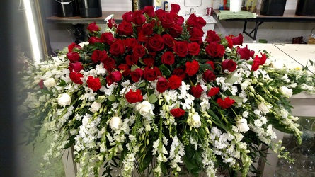 Red and White Casket Spray from Kelley's Florist in Lake Placid, FL