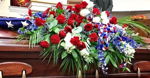 Patriotic Tribute casket spray from Kelley's Florist in Lake Placid, FL